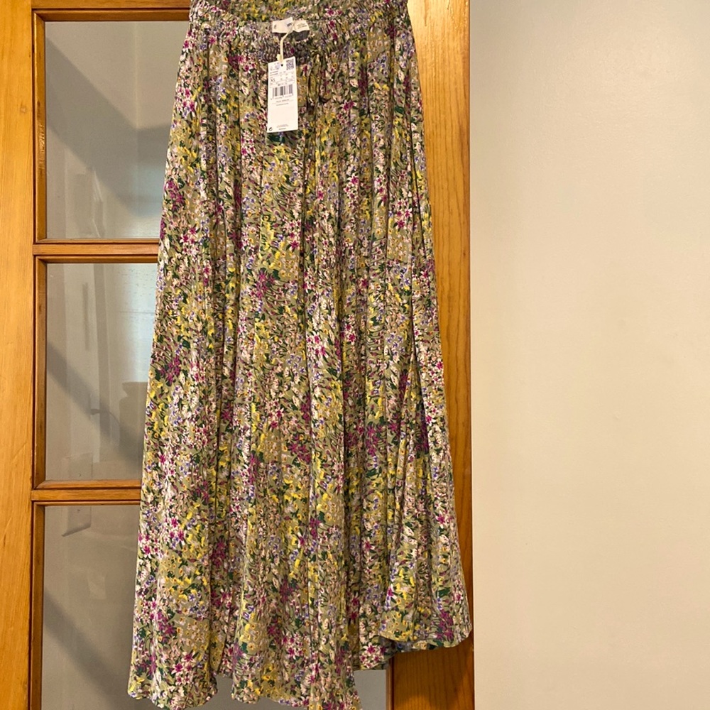 Long, romantic, floral skirt.  Elastic waist with drawstrings.